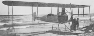 Ultralight aircraft pilot in open cockpit